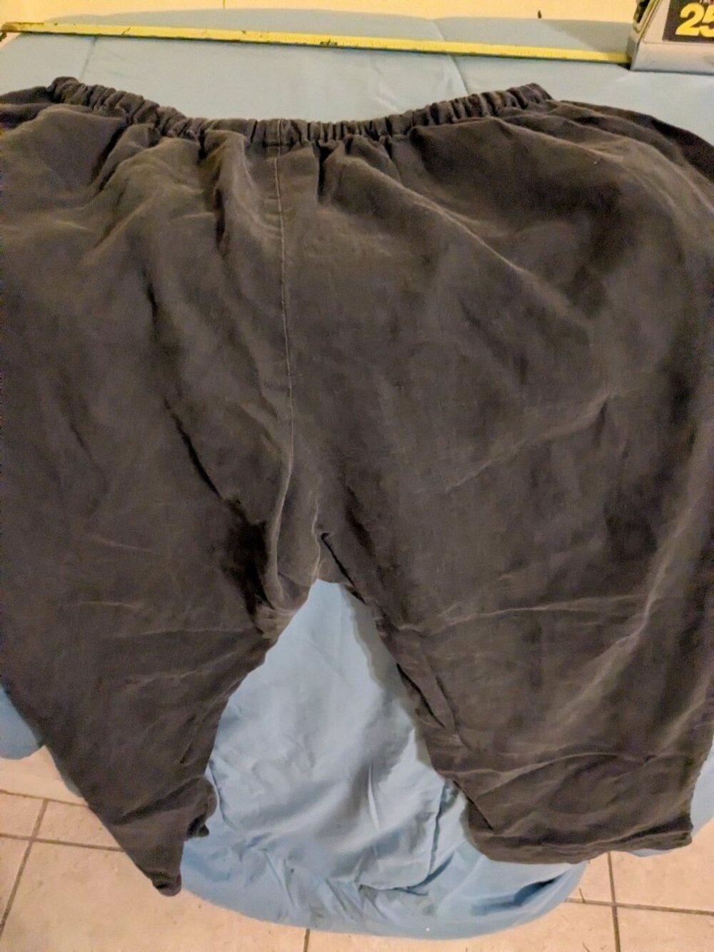 Stonewashed black drawstring pants.